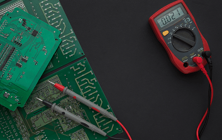 Close Up Circuit Board With Multimeter